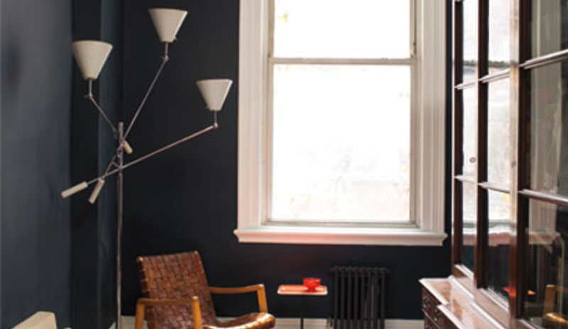 Deep blue painted walls in living room