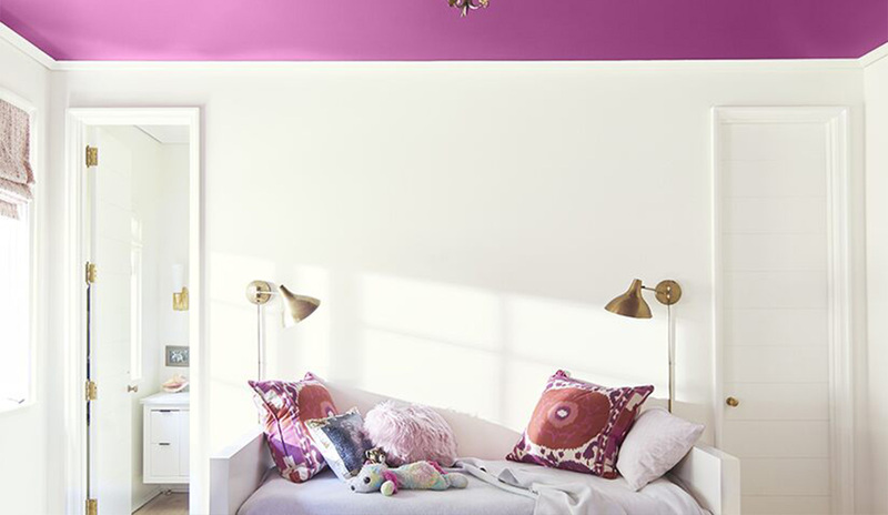 White bedroom painted in Paper Mache and rich purple ceiling in Twilight Magenta